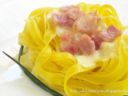 Nidi di Fettuccine al Prosciutto