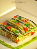 Tortino di cous cous e alici marinate