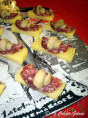 Antipasto di polenta al tartufo con salame di bufalo