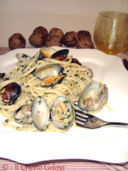 Spaghetti con vongole e sugo di noci