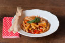 La magia del biologico: penne al farro con pomodorini e capperi
