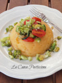 Cupoletta di patate con brunoise di broccoli e pomodori al profumo d'acciughe