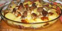 Agnello con pecorino e patate al forno