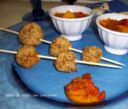 Polpettine di cous cous e carne al forno con peperonata