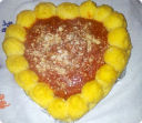 Straccetti di vitello in cuore di polenta.