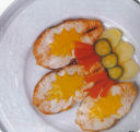 Scaloppe di salmone con salsa allo zafferano.