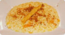 Risotto con zucca taleggio e crumble di amaretti.