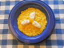 Risotto alla zucca con petali di ricotta.