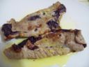 Involtini di fesa di vitello al radicchio, stracchino e succo di arancia