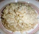 Risotto con acciughe e topinambur