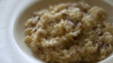 La ricetta del risotto con speck e scamorza per la cena autunnale