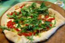 La ricetta della pizza con rucola e stracchino semplice ma gustosa