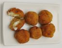 Crocchette di zucca per Carnevale con un ricco ripieno di formaggio