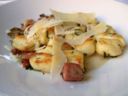 Prova gli gnocchi saltati con prosciutto e funghi per un primo veloce