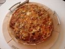 La quiche di Carnevale è una torta salata con funghi, salsiccia e scamorza affumicata