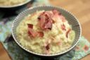 Gusta un risotto al prosciutto e Asiago profumato al whisky