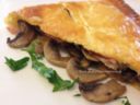 Calzone di pasta sfoglia ai funghi e prosciutto