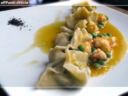 Ravioli di pesce e bietole con ragù di scampi e piselli