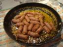 Secondi piatti: salsicce in salsa di arancia