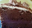 Torta delice al cioccolato farcita con panna e nutella