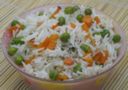 Ricette primi piatti: risotto con piselli, pancetta e carote