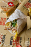 Grilled chicken wrap with grated swiss cheese