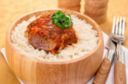 Agnello in umico con pomodoro ed erbe aromatiche