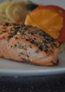 Secondi di pesce: il Salmone alla pana al pepe verde