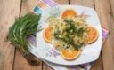 Farfalle con agretti, arancia e fiori di cavolo nero