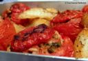 Pomodori ripieni di riso con patate al forno