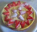 Torta al cacao, crema e fragole