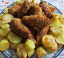 Ali di pollo croccanti con patate al forno