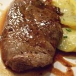 Lombo di maiale in salsa di cipolle