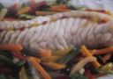 Filetto di pescatrice su letto di ortaggi