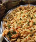 Spaghetti con gamberi e carciofi