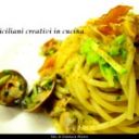 Spaghetti con vongole, zucchine e bottarga