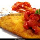 Paprika-schnitzel di pollo (cotoletta di pollo con peperoni e pomodori alla paprika)