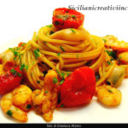 Spaghetti con ragù di gamberi, calamari e scampi