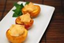 Ricetta: Pesche al forno farcite alla ricotta