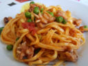 Tagliolini con seppioline, piselli e pomodoro