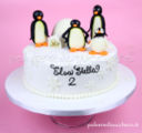 Torta decorata per il compleanno di una bimba con Pingu e famiglia in pasta di zucchero