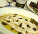 Branzino al forno capperi e olive taggiasche