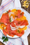 Carpaccio di salmone affumicato, arancia e salmone