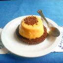Mousse ai cachi con marquise al cioccolato