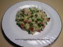 RISOTTO CON PROSCIUTTO  E PISELLI