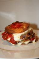 Millefoglie di melanzane profumata con Mozzarella di Bufala e Pomodorini confit