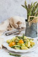 Ricetta gnocchi di ricotta con asparagi di Altedo IGP, salsiccia e pomodorini gialli